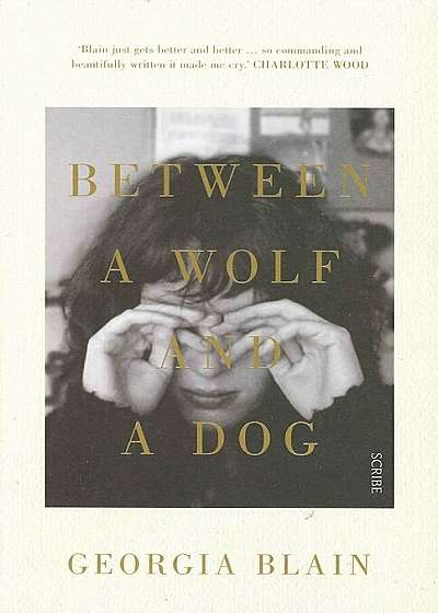 Between a Wolf and a Dog, Paperback