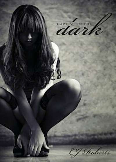 Captive in the Dark: The Dark Duet, Paperback